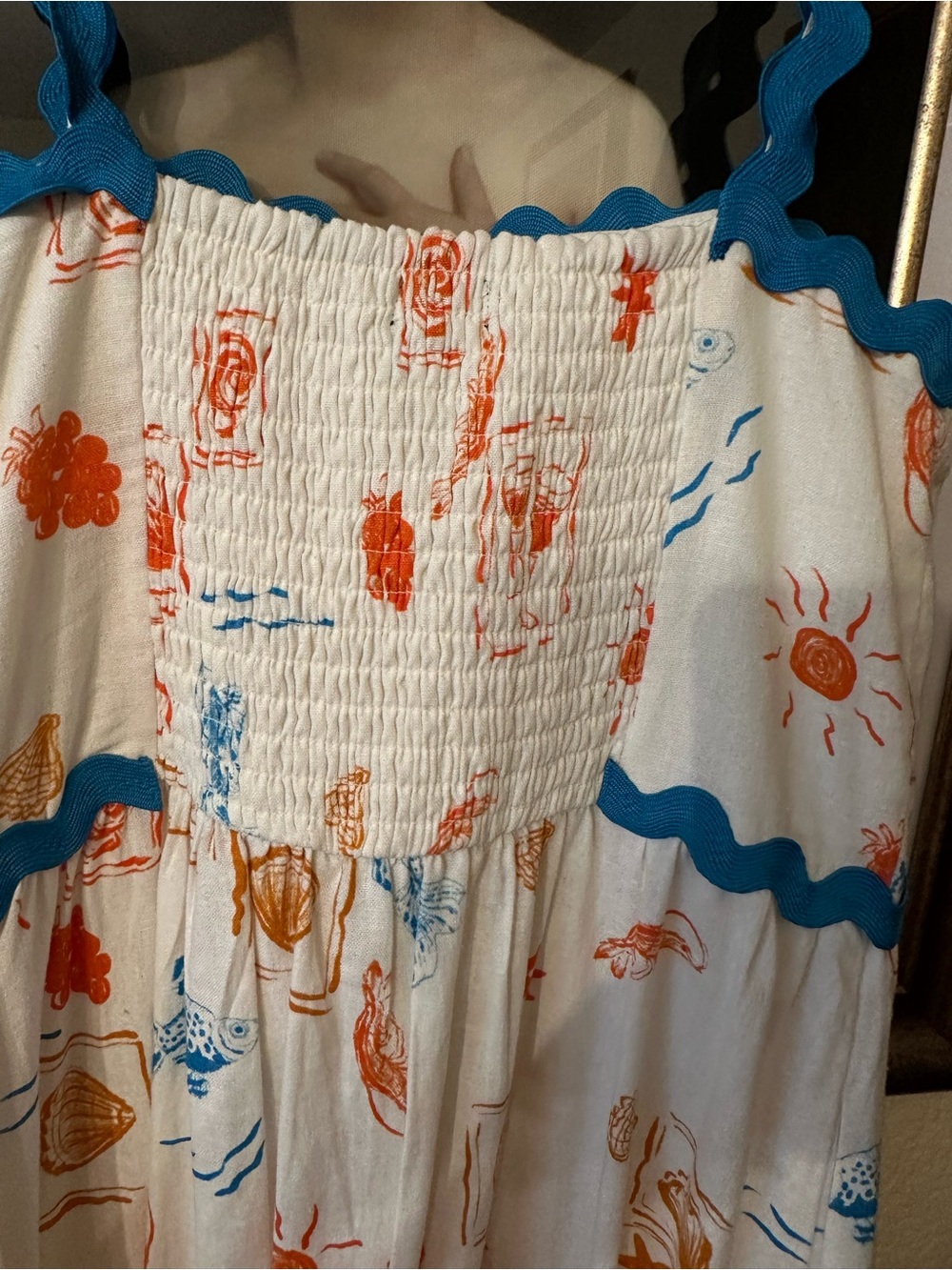CeCe Cream Maxi Dress with Blue Trim and Orange Print Detail - Picture 9 of 10